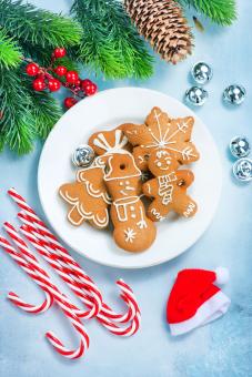 cookies and candycane on a table, christmas background