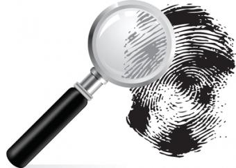 This is a picture of a magnifying glass and a finger print