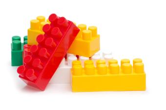 lego pieces, yellow red green and white