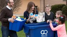 Neighborhood comes together to recycle around new cart.